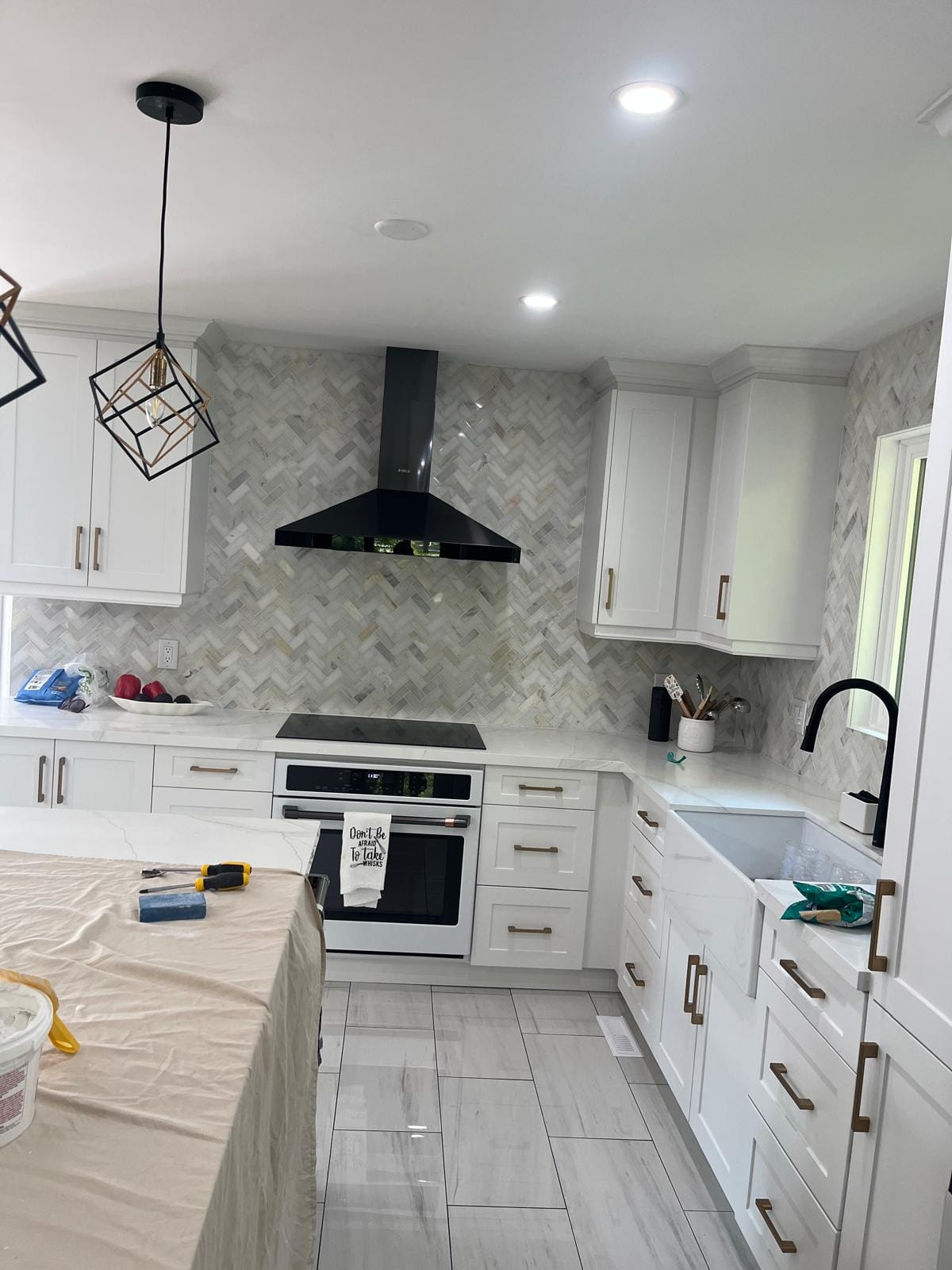 Kitchen with Herringbone Backsplash